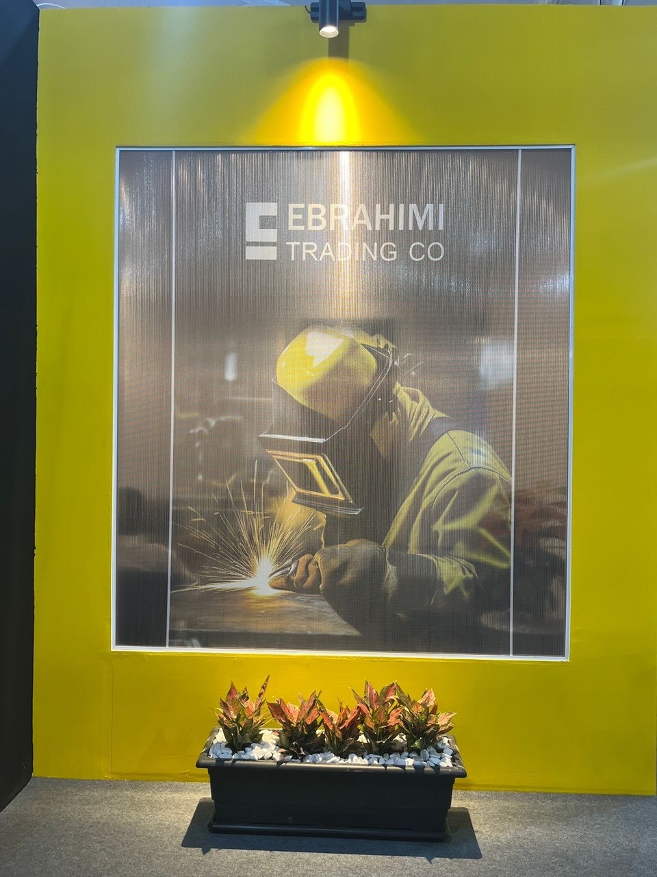 Ebrahimi Trading Co. exhibition identity and welding display